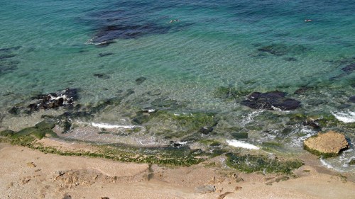 The coast where chunks of ruins still lay today