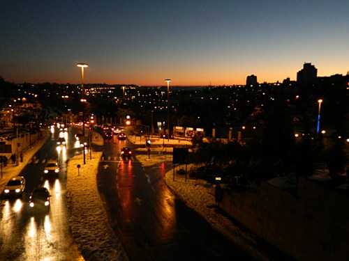 Traffic and snow in the last minutes of light