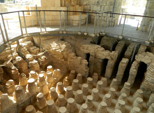 Beneath the bathhouse's floor