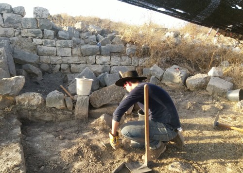 Nissim digging in his square