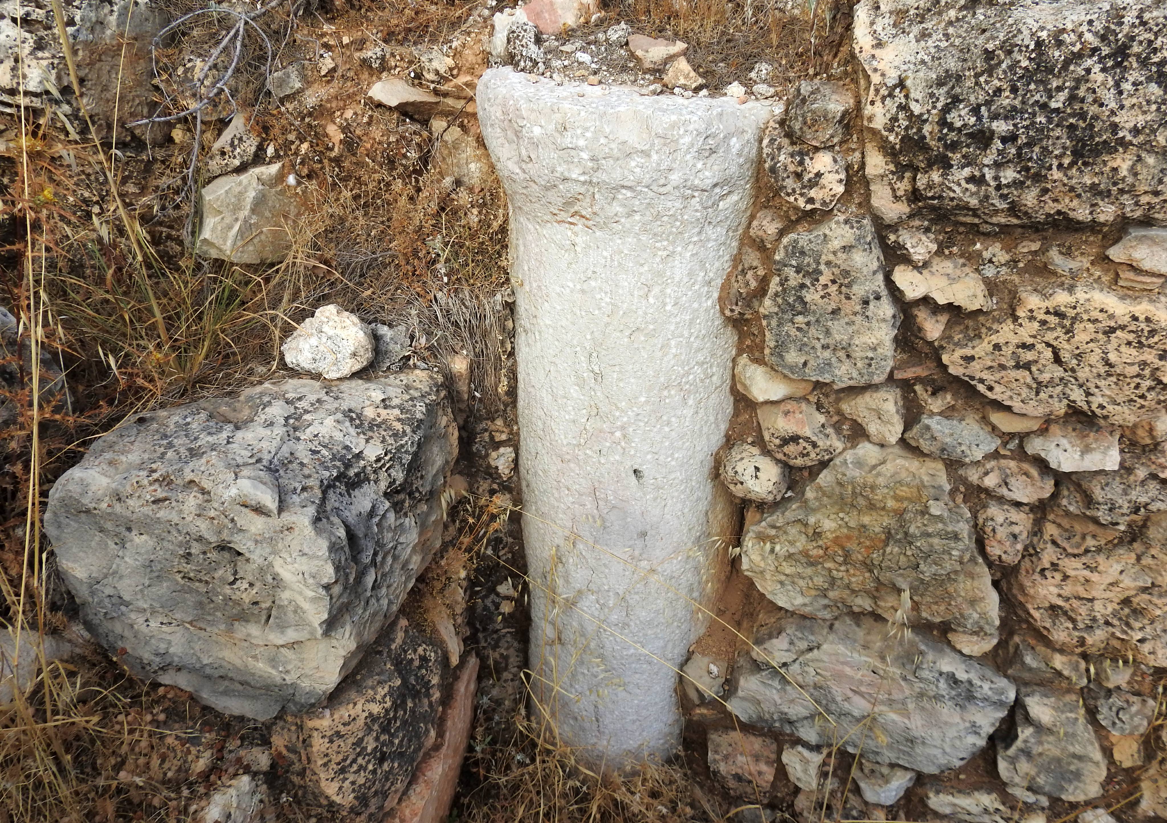 Basilica column still buried in the dirt